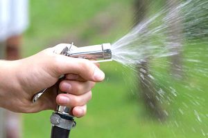 Man calls police after his neighbor soaked him with water in Vero Beach.