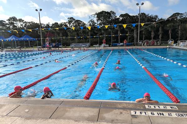 Bolt Aquatics warming up for the breast cancer fundraiser meet in Sebastian, Florida.