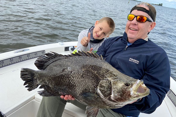 David Stewart and Capt. Glyn's grandson near Sebastian Inlet.