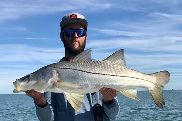 Corbin Koenig caught a large snook at the Sebastian Inlet.