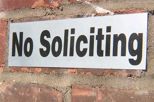 Sebastian councilwoman leaves her business card on a no soliciting sign.