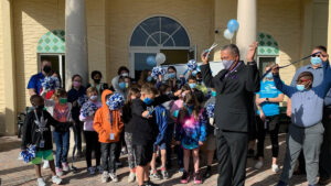 Sebastian Vice Mayor Fred Jones cuts the ribbon during the grand reopening of the Boys and Girls Club.