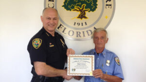 Fellsmere Police Chief Keith Touchberry (left) and Bill Lawrence