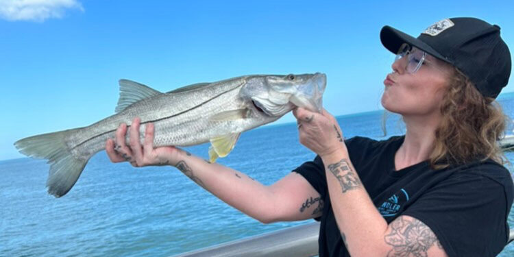 Babz Stewart with snook on North Jetty