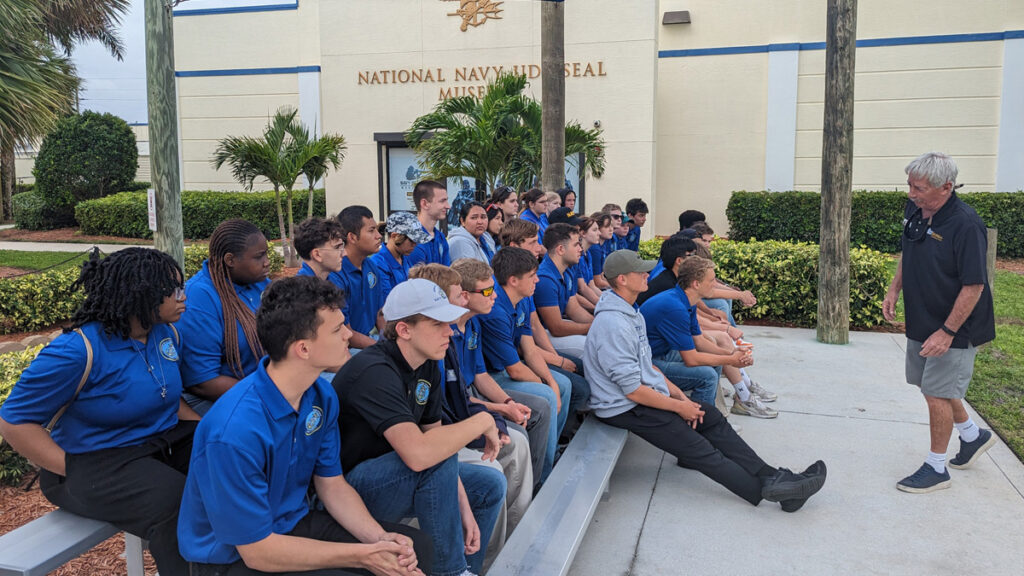 Mr. Andy Brady speaks to SRHS NJROTC Cadets about the history of the Navy SEALs