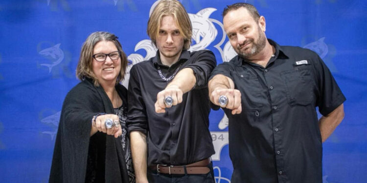 Holly Hamilton (left) with her son Patrick (center) and husband James (right)